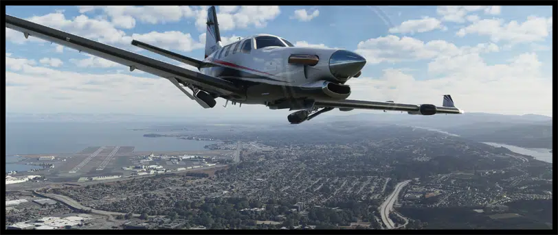 Microsoft Flight Simulator 2020 Banner Plane flying over ground terrain