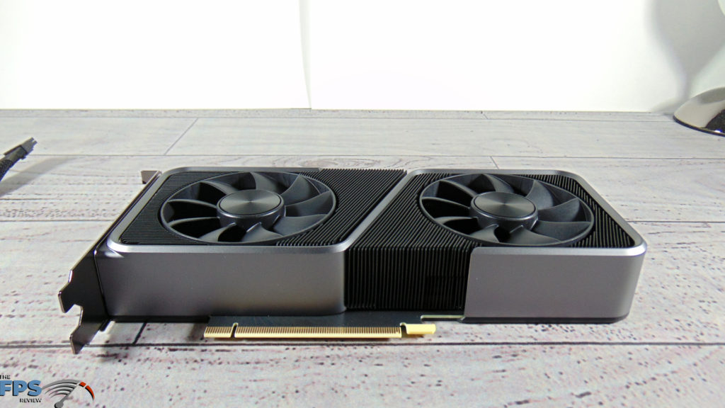 NVIDIA GeForce RTX 3070 Founders Edition video card side view on white background table