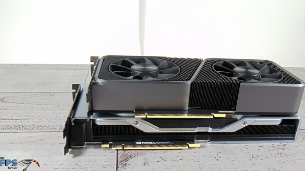 NVIDIA GeForce RTX 3070 Founders Edition on top of NVIDIA GeForce RTX 2070 SUPER Founders Edition on table showing size comparison