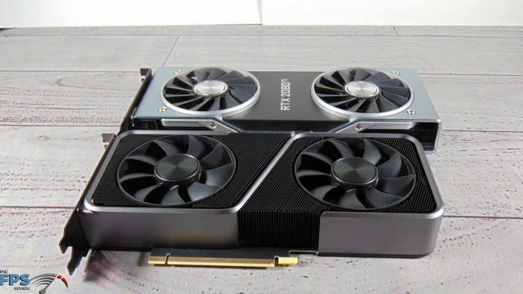 NVIDIA GeForce RTX 3070 Founders Edition in front of NVIDIA GeForce RTX 2080 Ti Founders Edition on table angled view