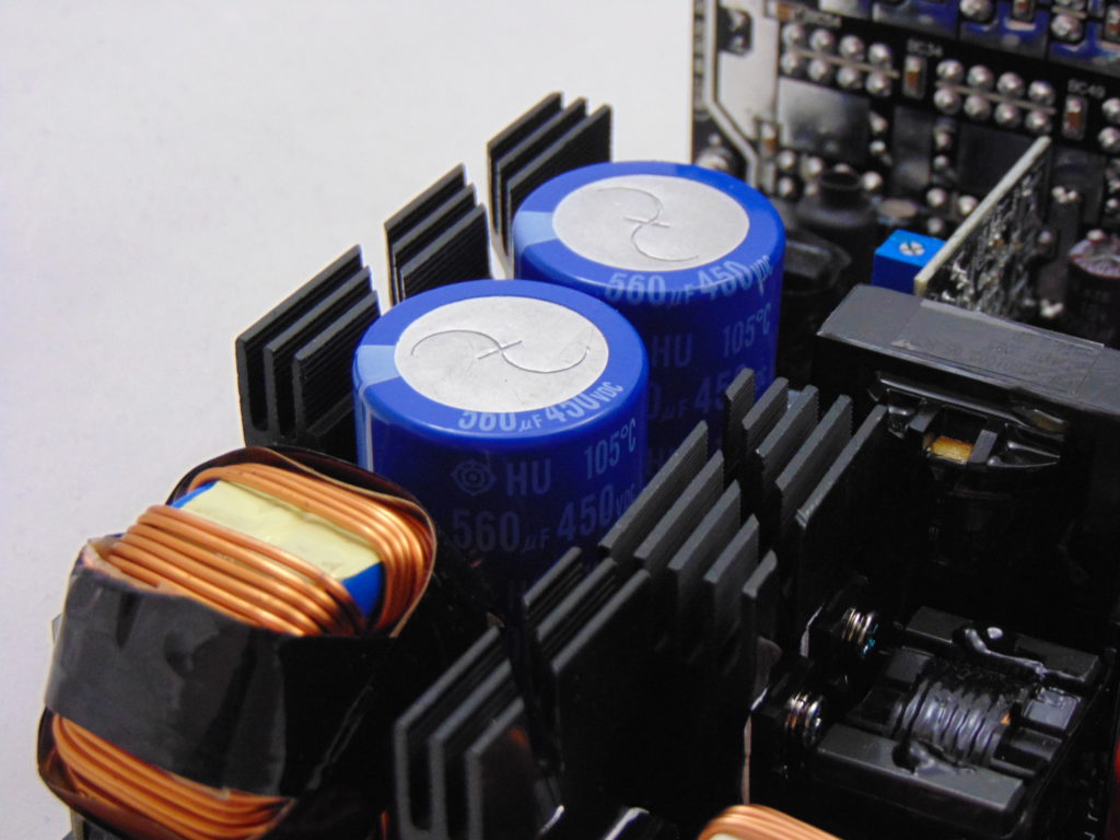 FSP Hydro PTM PRO 1200W Power Supply Closeup of Capacitors and Heatsinks