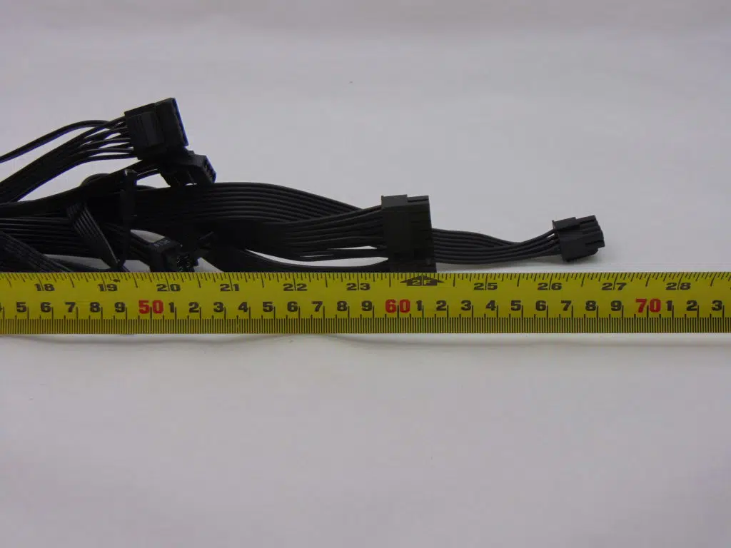 MSI A850GF 850W Power Supply measuring cable length next to ruler