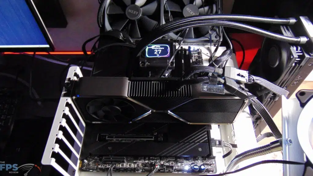 MSI MEG Z690 UNIFY Motherboard Top View with MSI MEG Coreliquid S360 AIO Cooler installed with LCD Screen Turned On