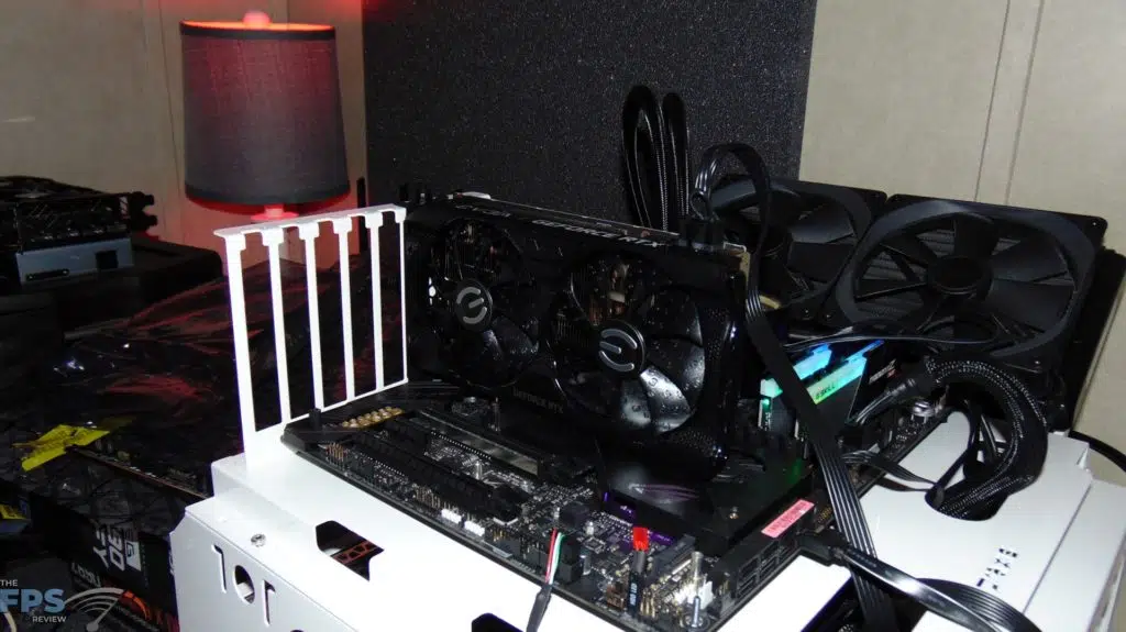 EVGA GeForce RTX 3050 XC BLACK GAMING video card installed in computer system angled view