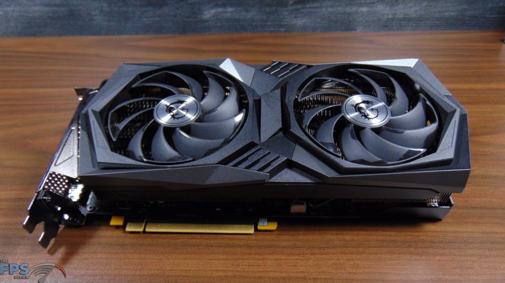 MSI GeForce RTX 3050 GAMING X Video Card Laying On Table Top View