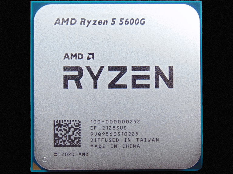 AMD Ryzen 5 5600G APU Top View on Black Textured Background
