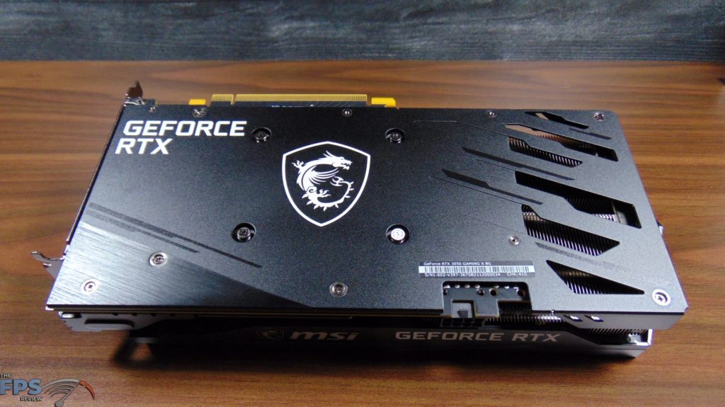 MSI GeForce RTX 3050 GAMING X Video Card Laying On Table Bottom View
