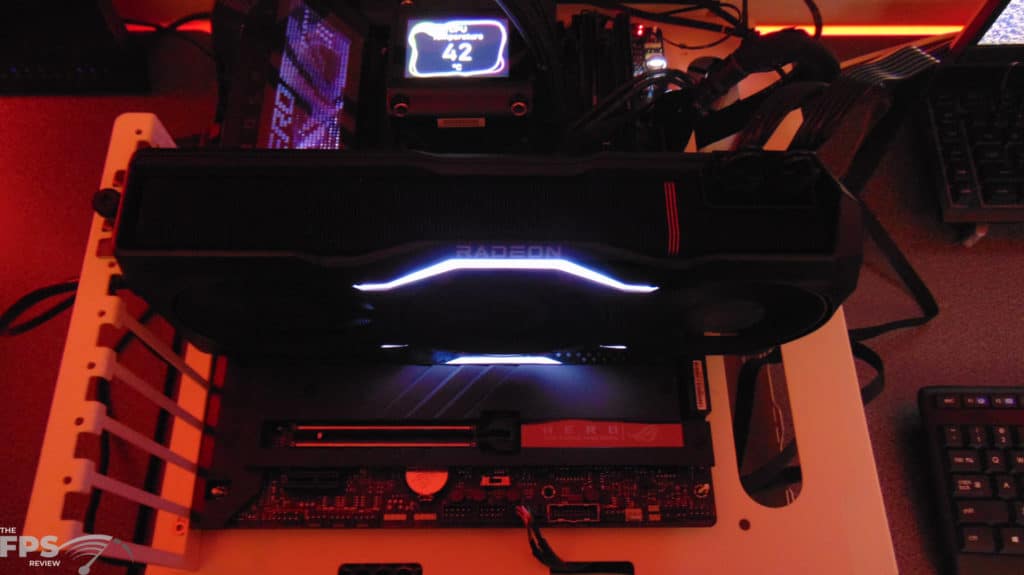 AMD Radeon RX 7900 XTX Video Card In Computer Top View LED Lit Up