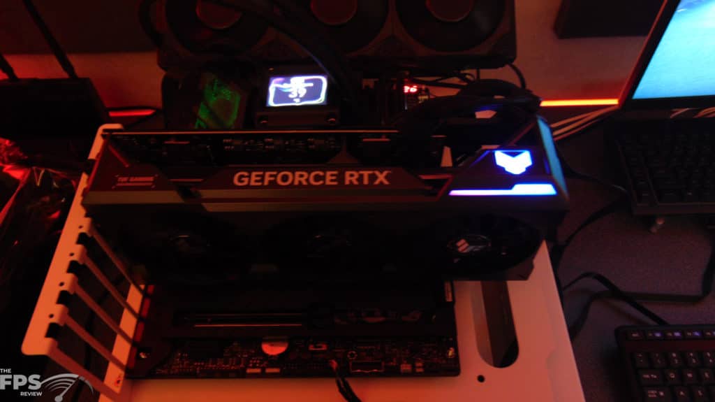 ASUS TUF Gaming GeForce RTX 4070 Ti 12GB OC Edition Installed in Computer Top View in the Dark with RGB Lit Up