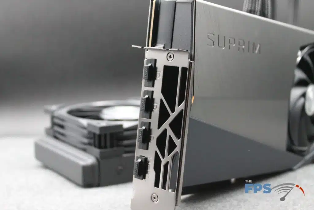 MSI RTX 4090 SUPRIM LIQUID X angled picture with radiator behind