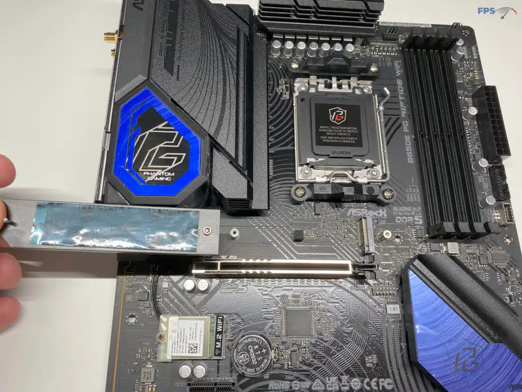 B650E PG Riptide WiFi below top Heat Sync