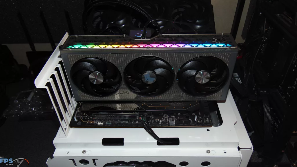 SAPPHIRE NITRO+ AMD Radeon RX 9060 XT Video Card Installed in Computer RGB Turned On