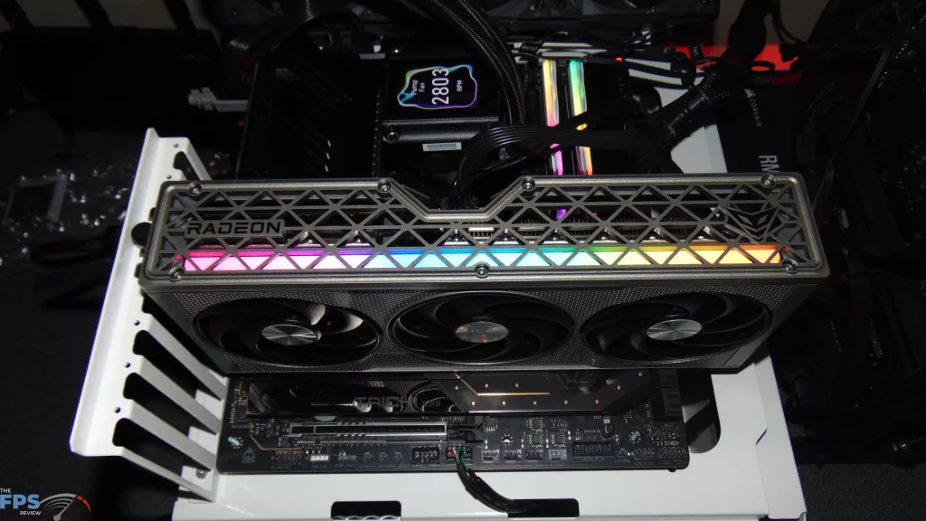 SAPPHIRE NITRO+ AMD Radeon RX 9060 XT Video Card Installed in Computer RGB Turned On