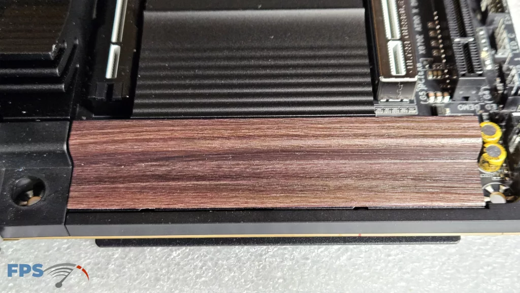 GIGABYTE X870E AERO X3D DARK WOOD motherboard: wood accent